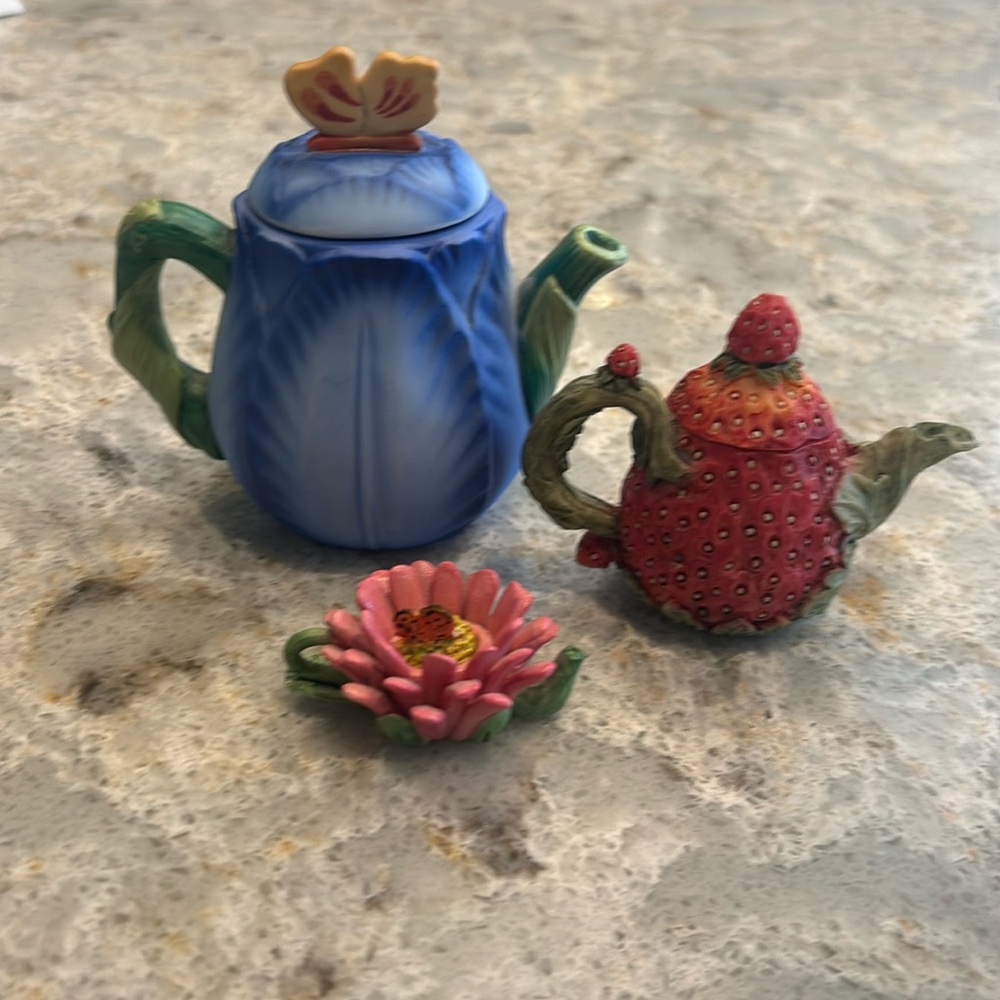 Teapot set, Miniature with removable lids. Large is Avon. Two smaller unmarked.